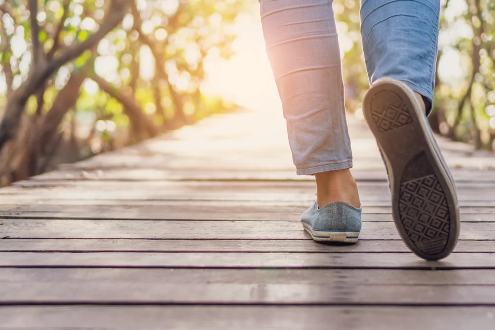 person out walking on a boardwalk