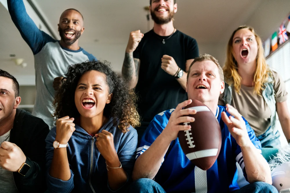 group of friends watching football