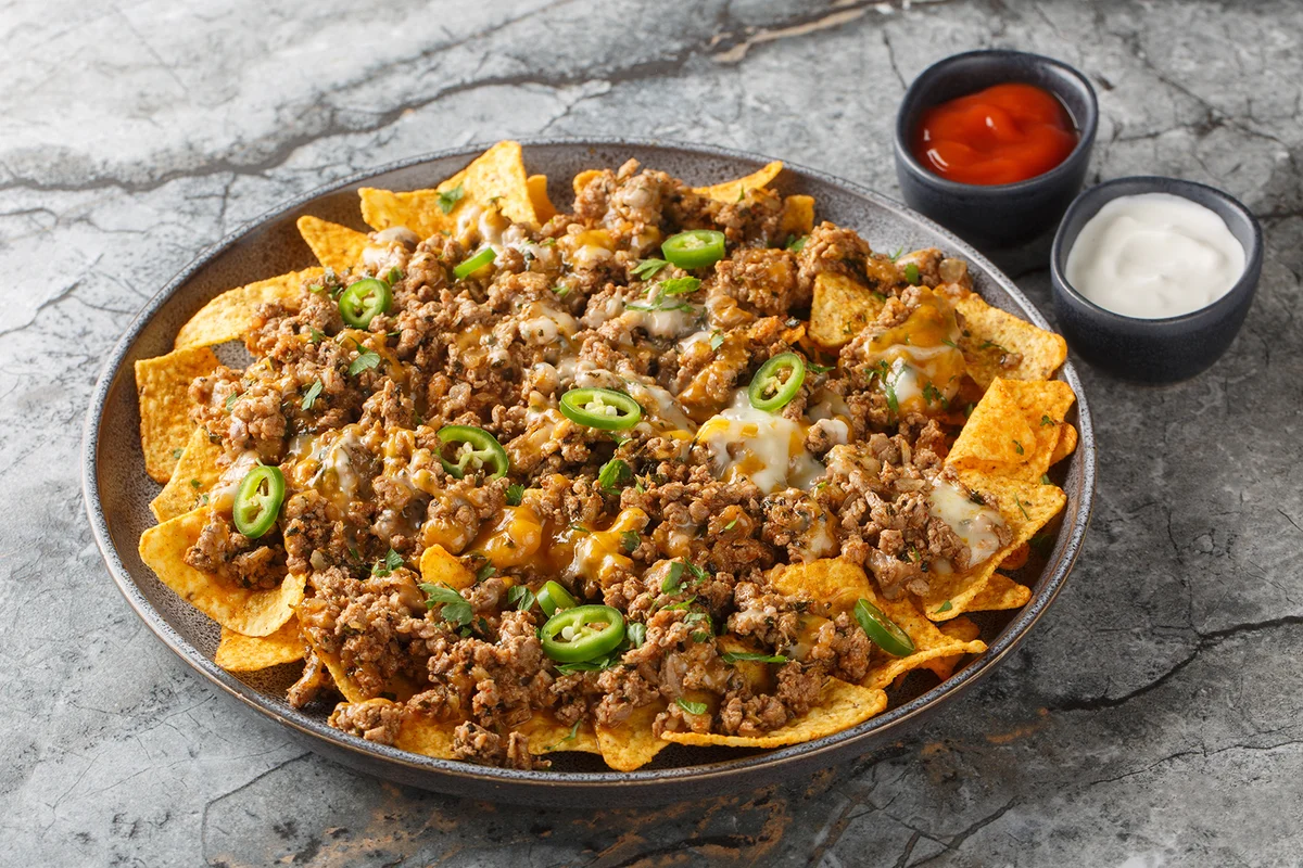 Ground Beef and Cheese Nachos with jalapeno peppers