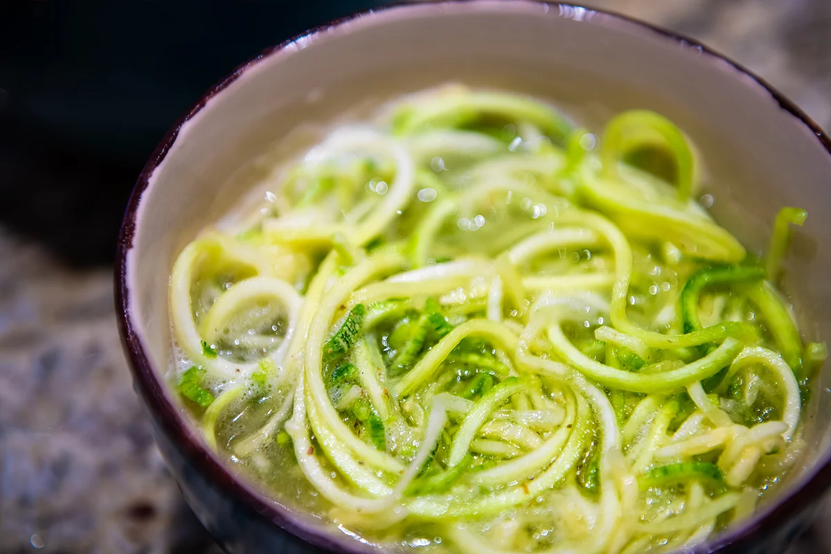 shredded spiralized zucchini or cucumber raw noodles pasta