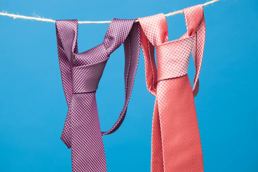 ties hanging on a clothesline