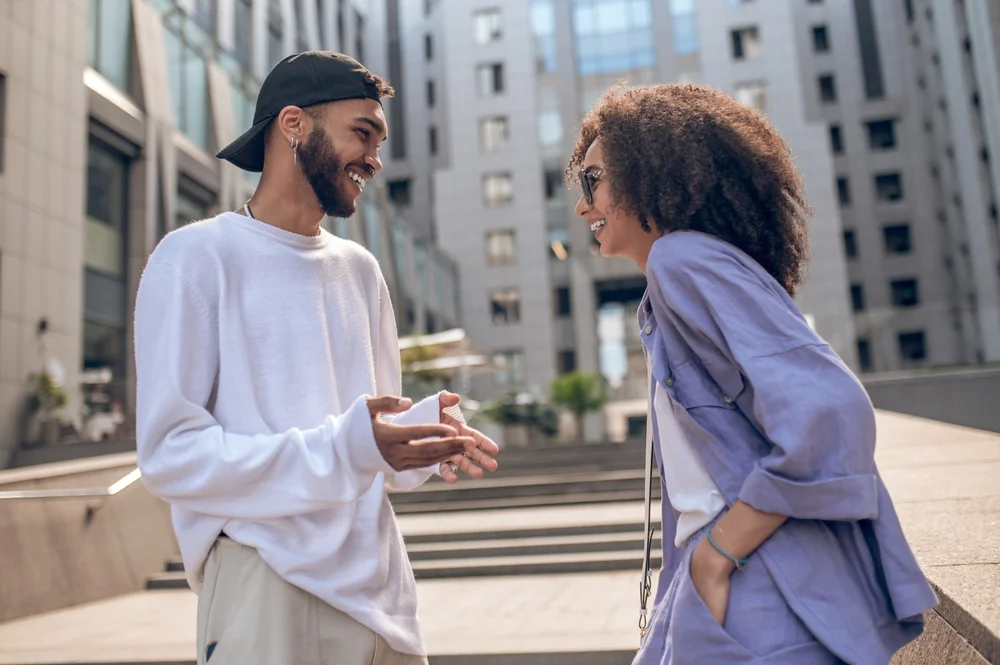 man and woman talking