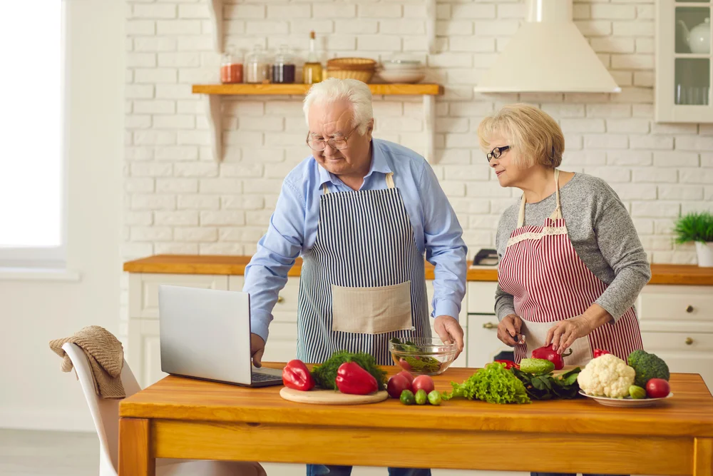 senior couple cooking together