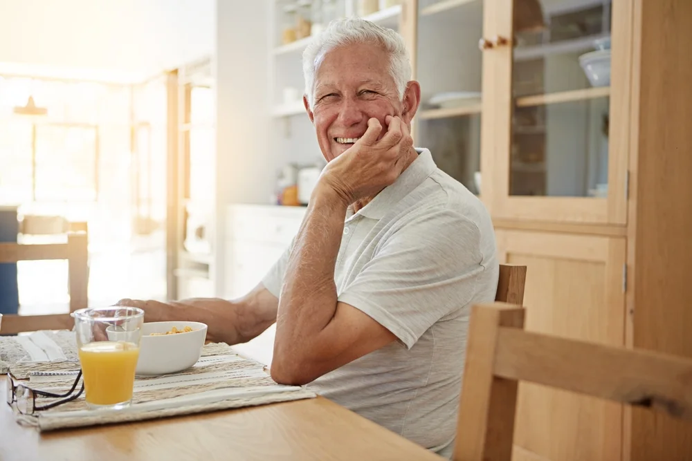 retired man having breakfast