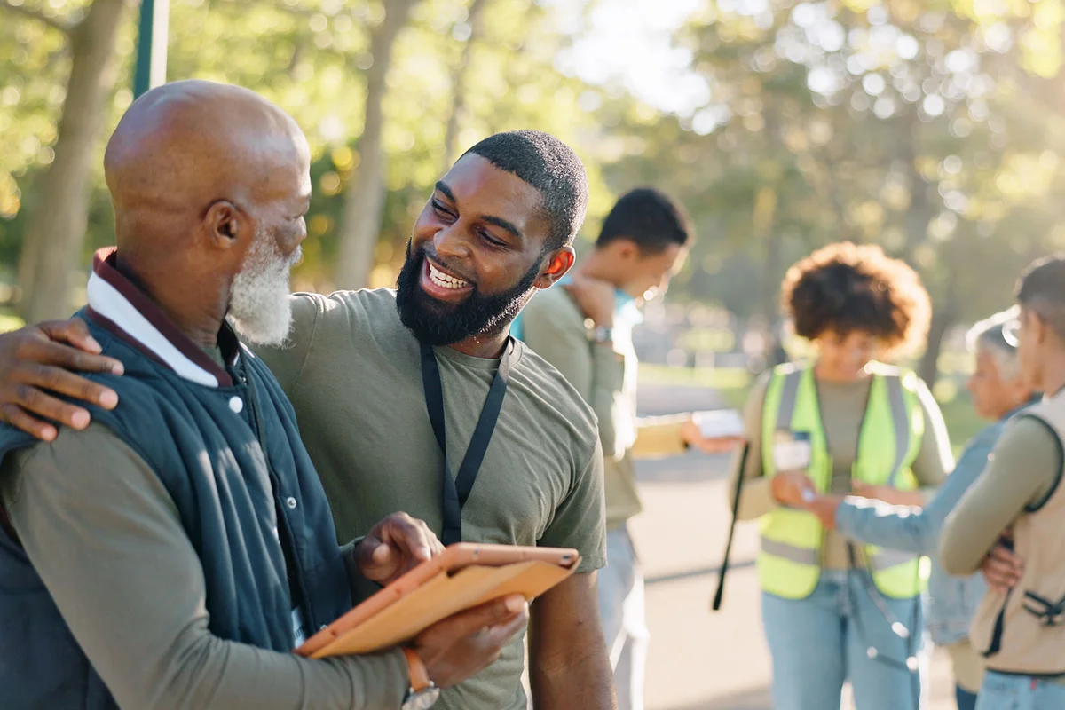 people and volunteers success with tablet for data support, community project or nature sustainability