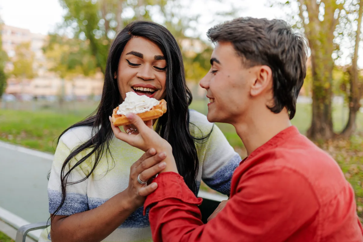 two people with whipped cream