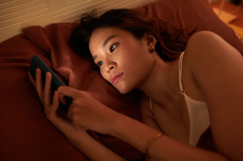 woman doomscrolling
