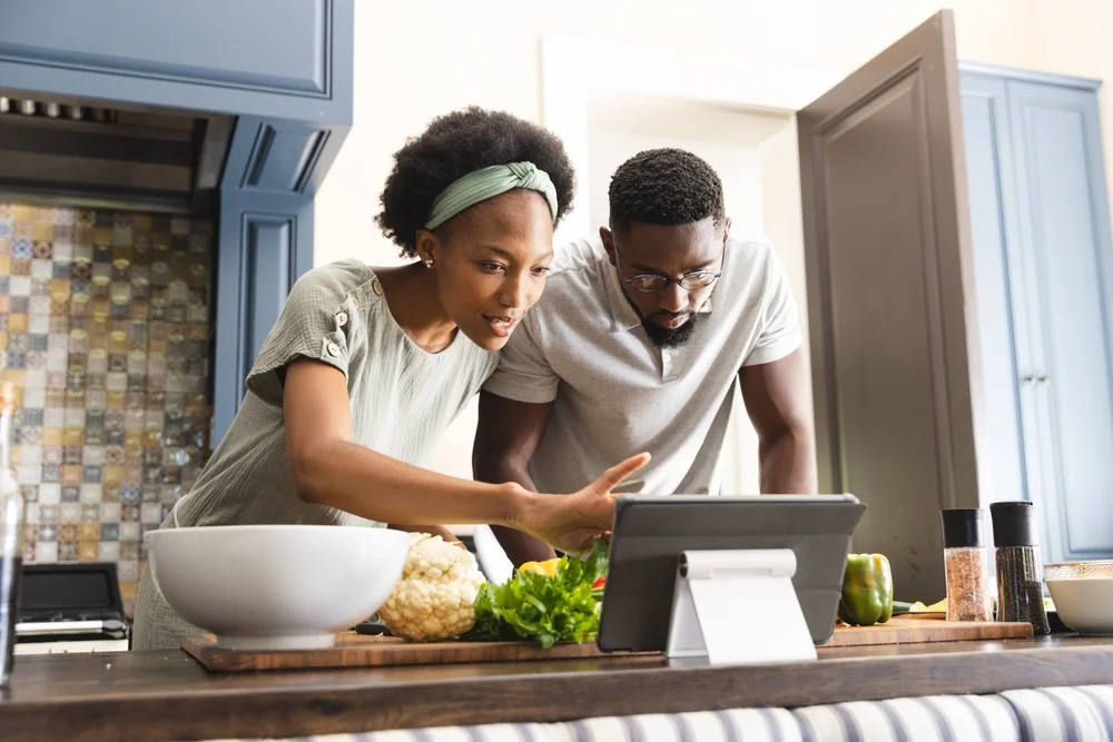 couple in the kitchen cooking