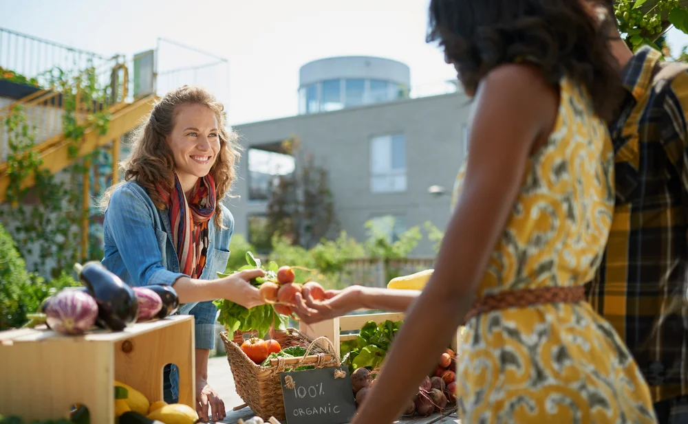 woman shopping at a farmer's market