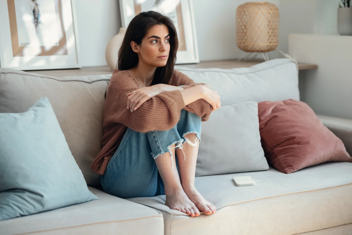 woman looking sad
