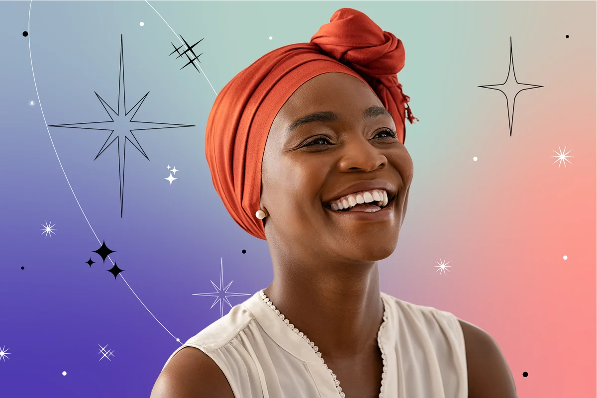 Smiling woman with orange headscarf