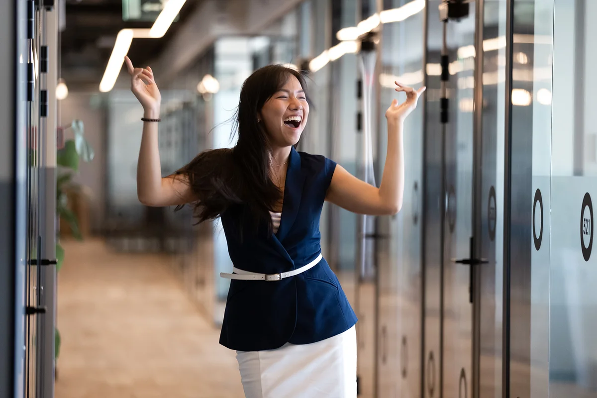 woman celebrate success in victory dance