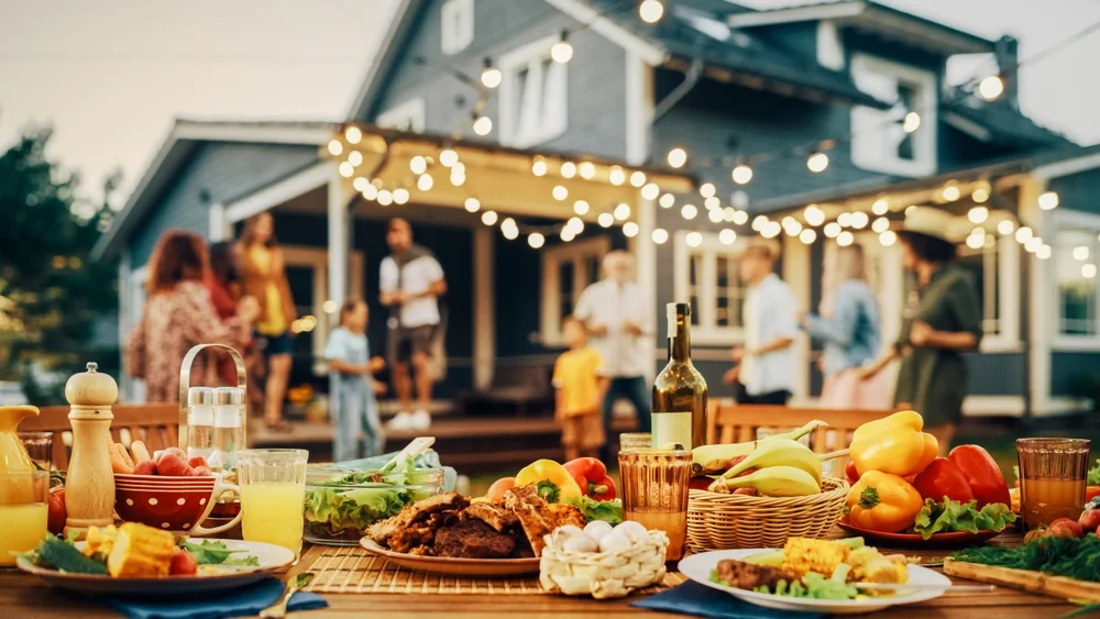 spread of BBQ and sides at an outdoor party