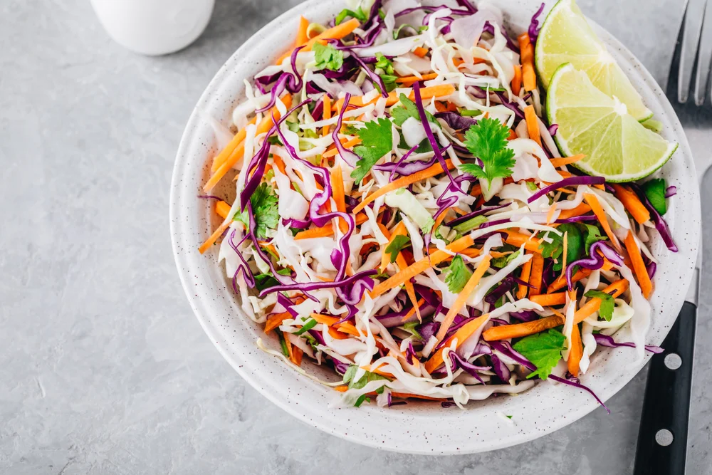 Plate of slaw with lime and cilantro