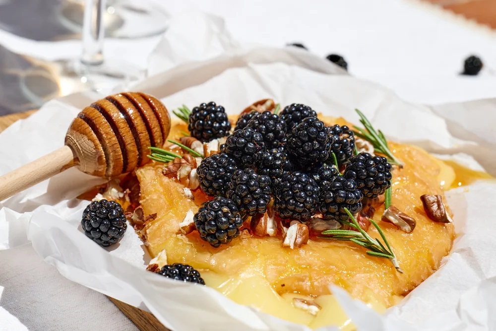 baked brie with blackberries, walnuts, and honey