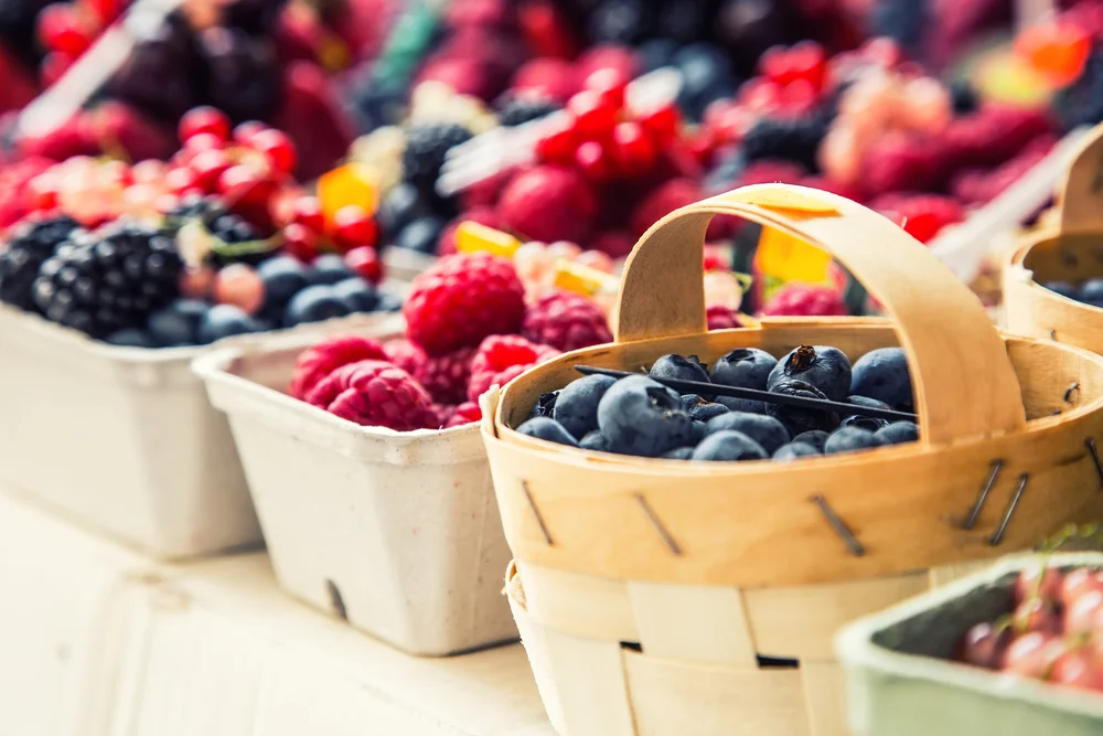 baskets of berries at the farmer's market