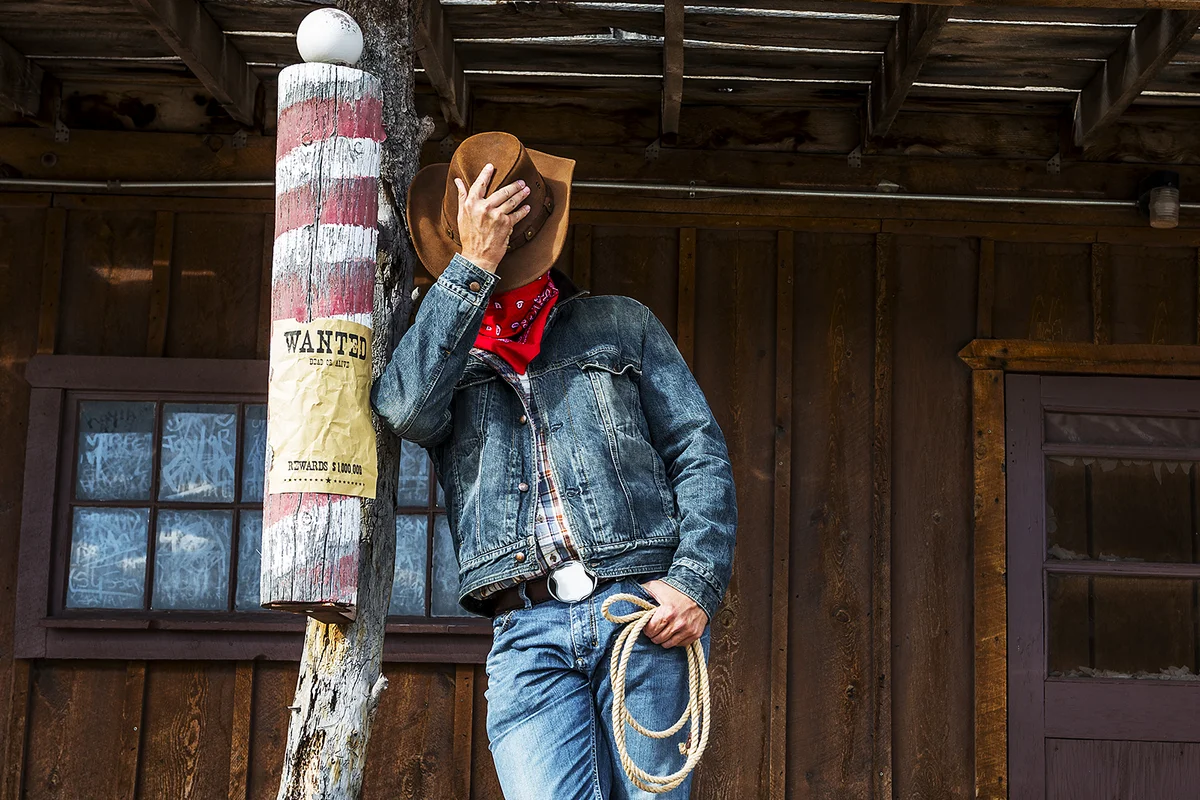 cowboy takes time to rest and reflect