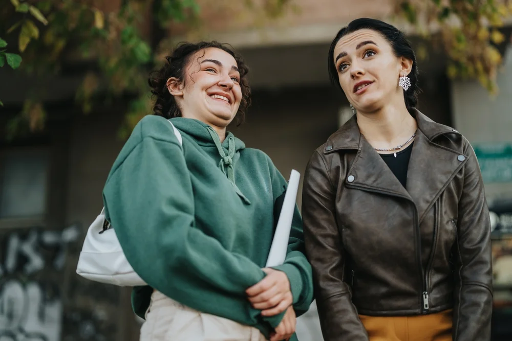 two women having an awkward conversation