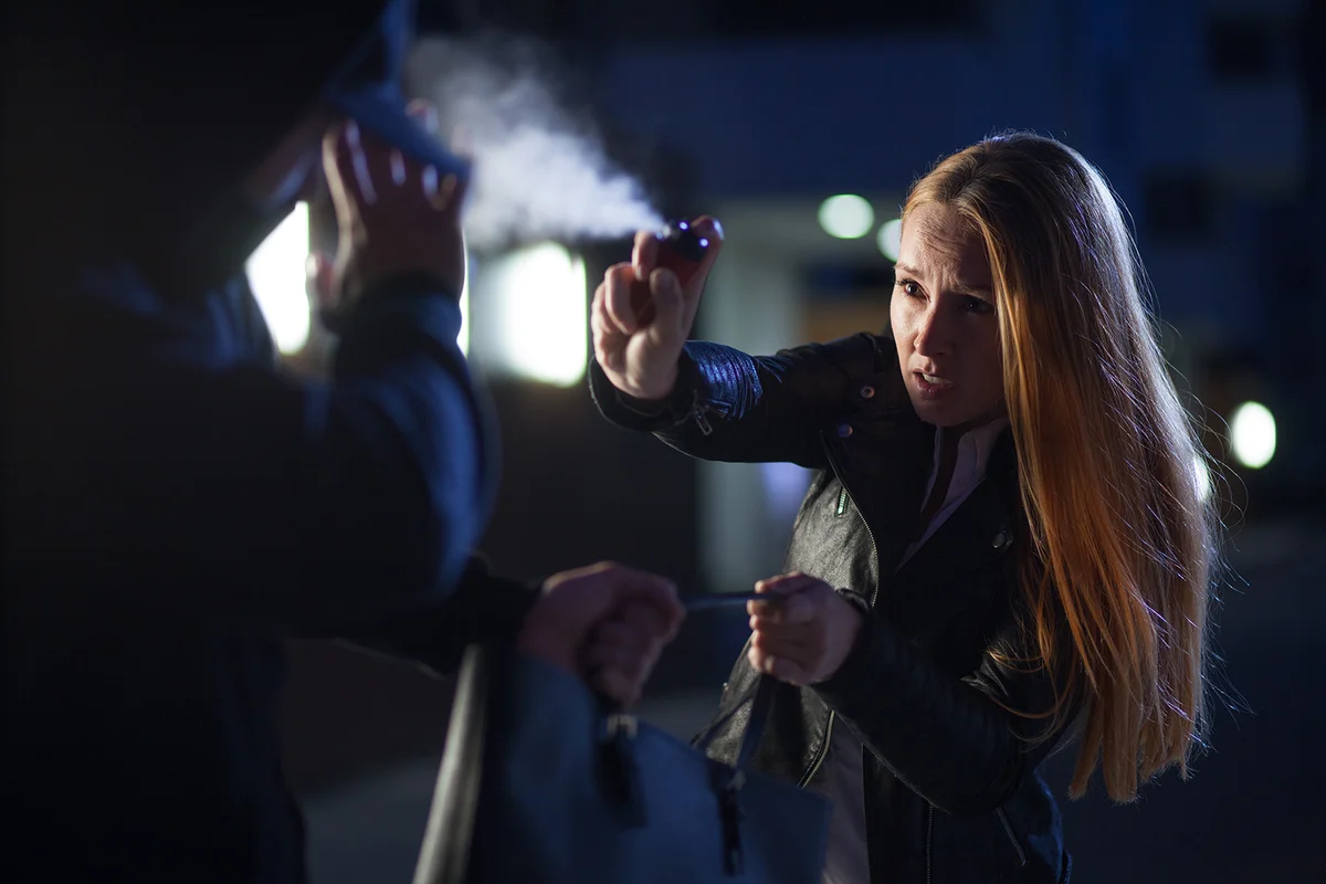 pepper spray or tear gas for self-defense by woman