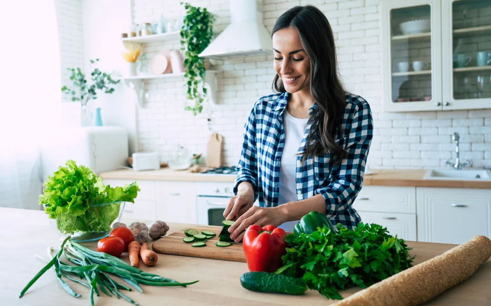 woman chopping veggies