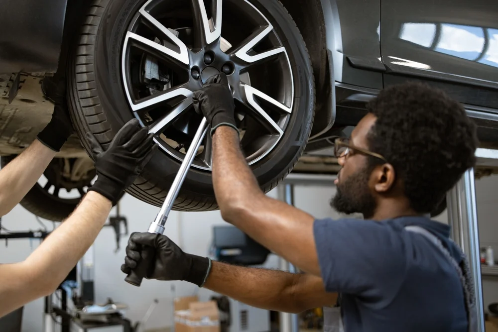 mechanics changing tires