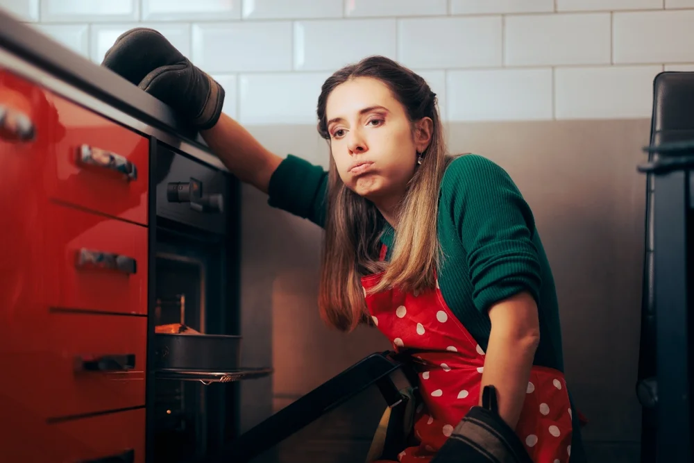 tired woman cooking