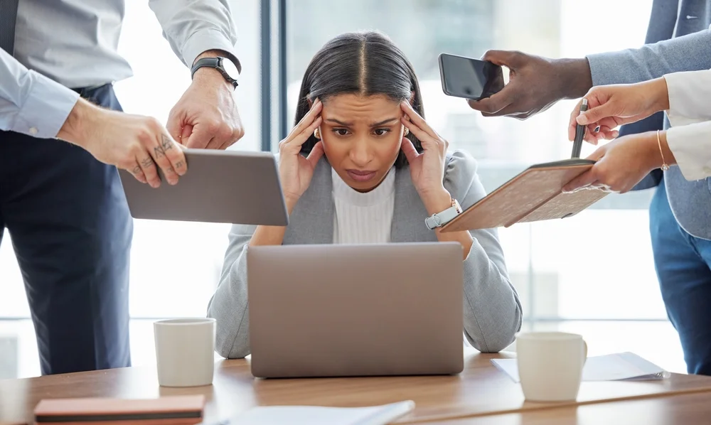 Stressed woman at computer