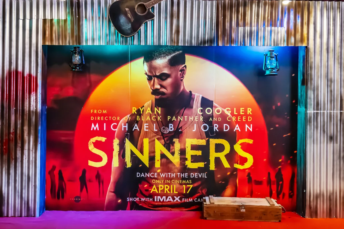 standee of a movie called Sinners Display at the cinema