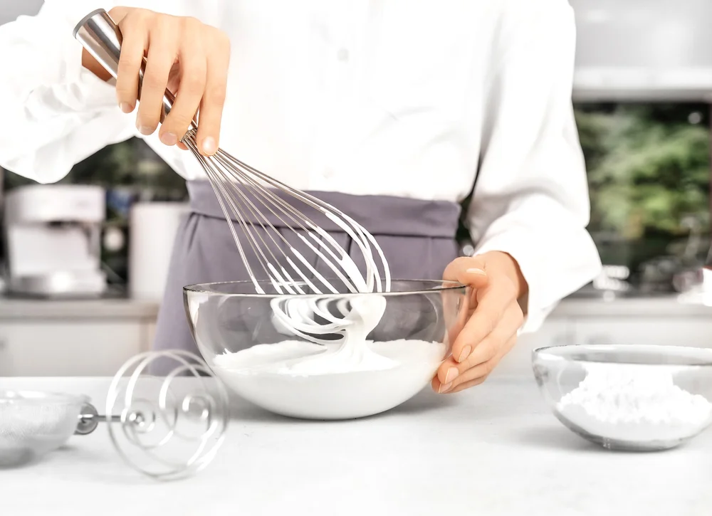woman whipping cream