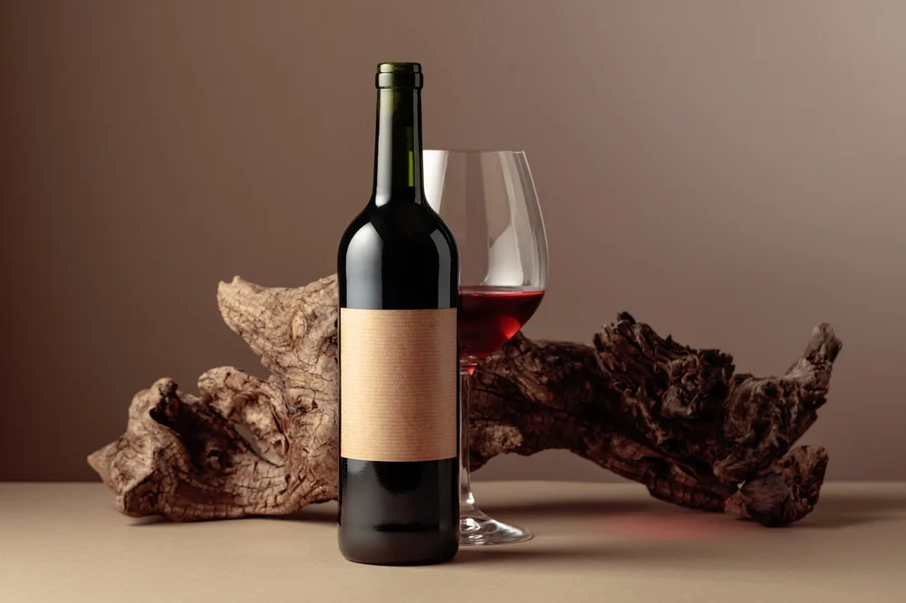 red wine glass and bottle