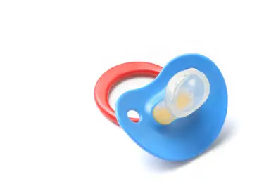 Pacifier baby shower game Image used under license with istockphoto
