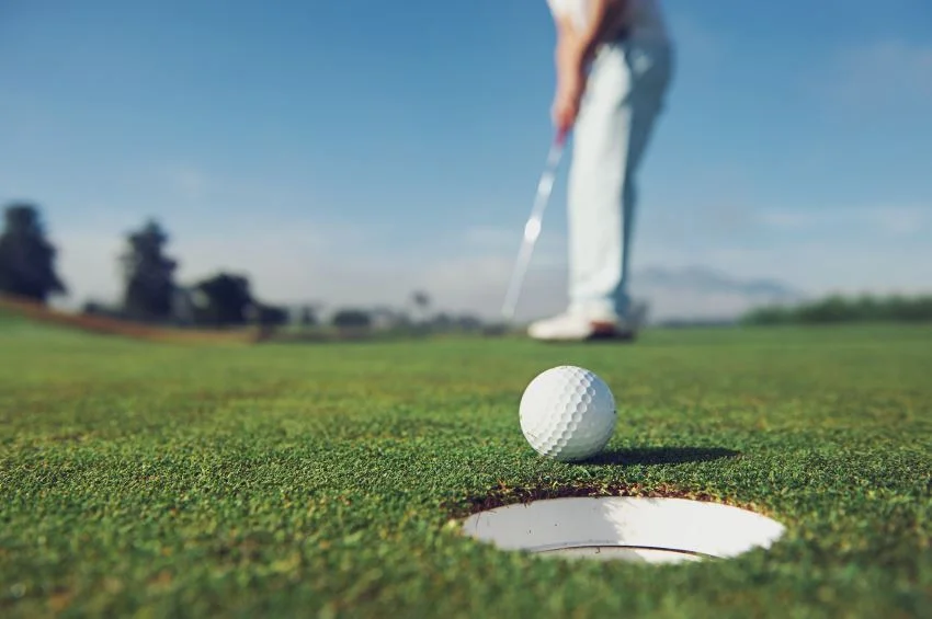 golfer making a putt