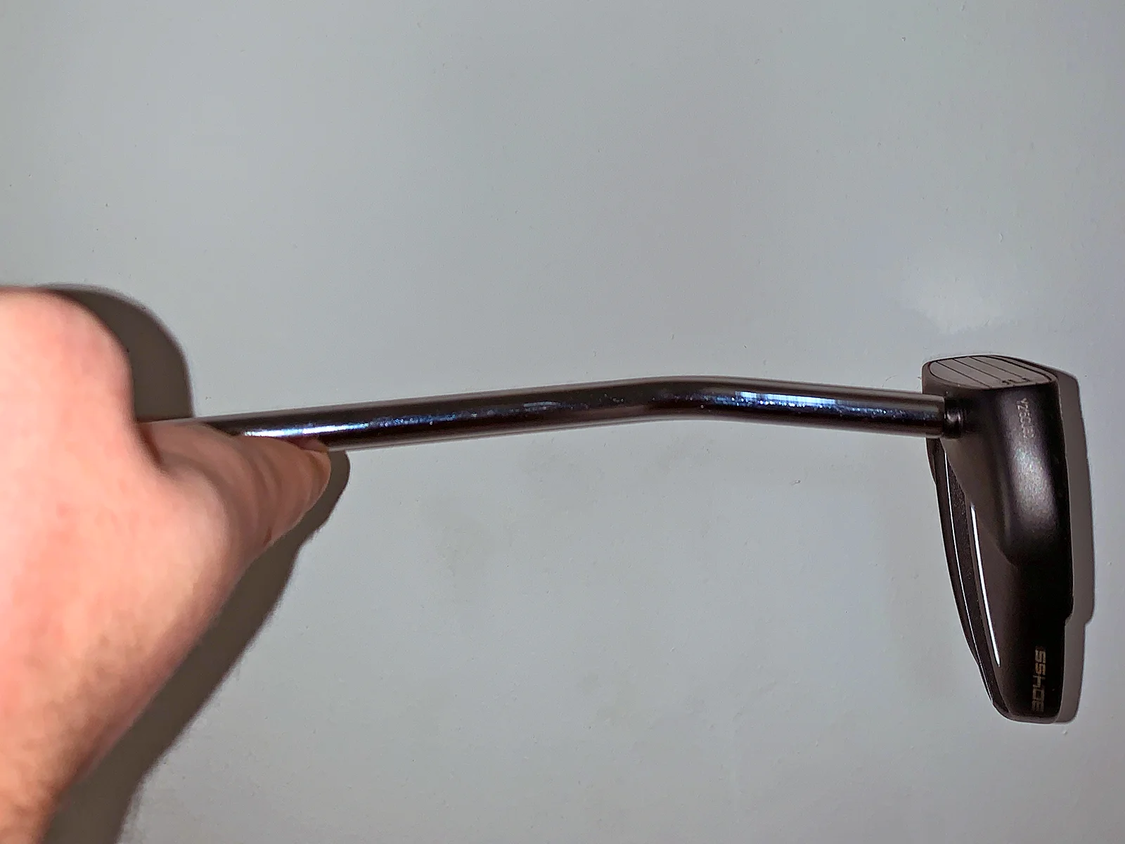 Face-balanced putter with the face pointing up