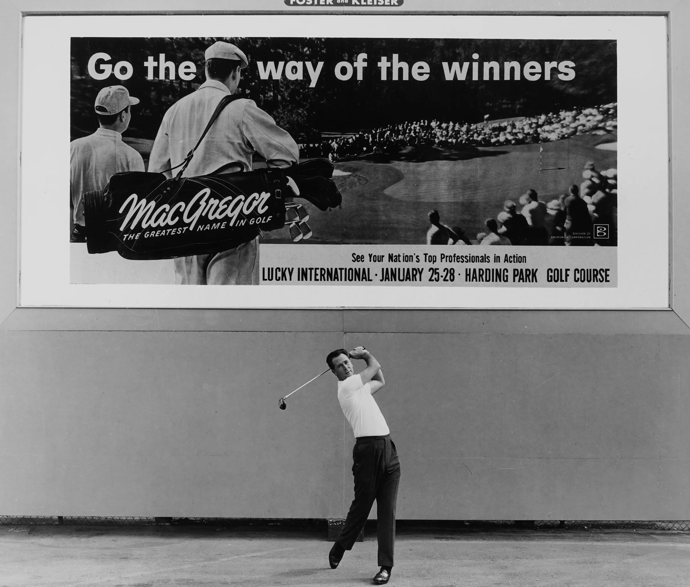 Tony Lema hits a shot in front of MacGregor billboard