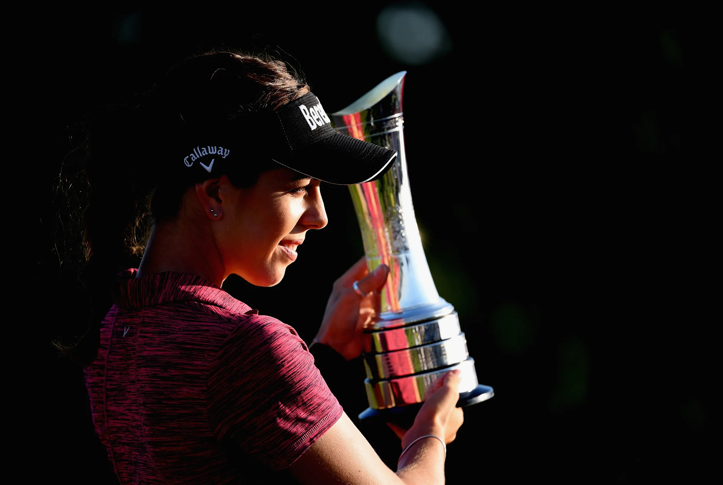 Georgia Hall hoists the 2018 AIG Women's British Open trophy
