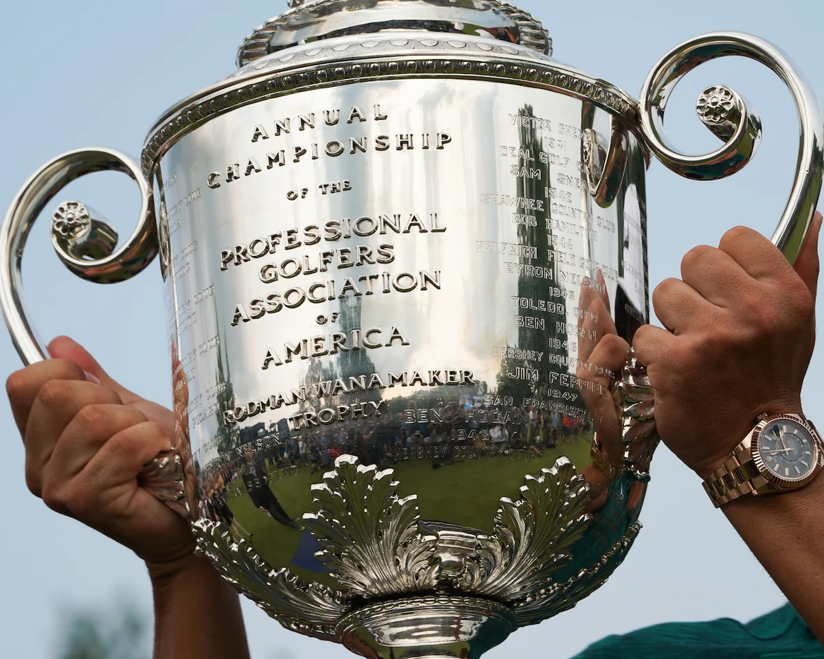 The Wanamaker trophy held up