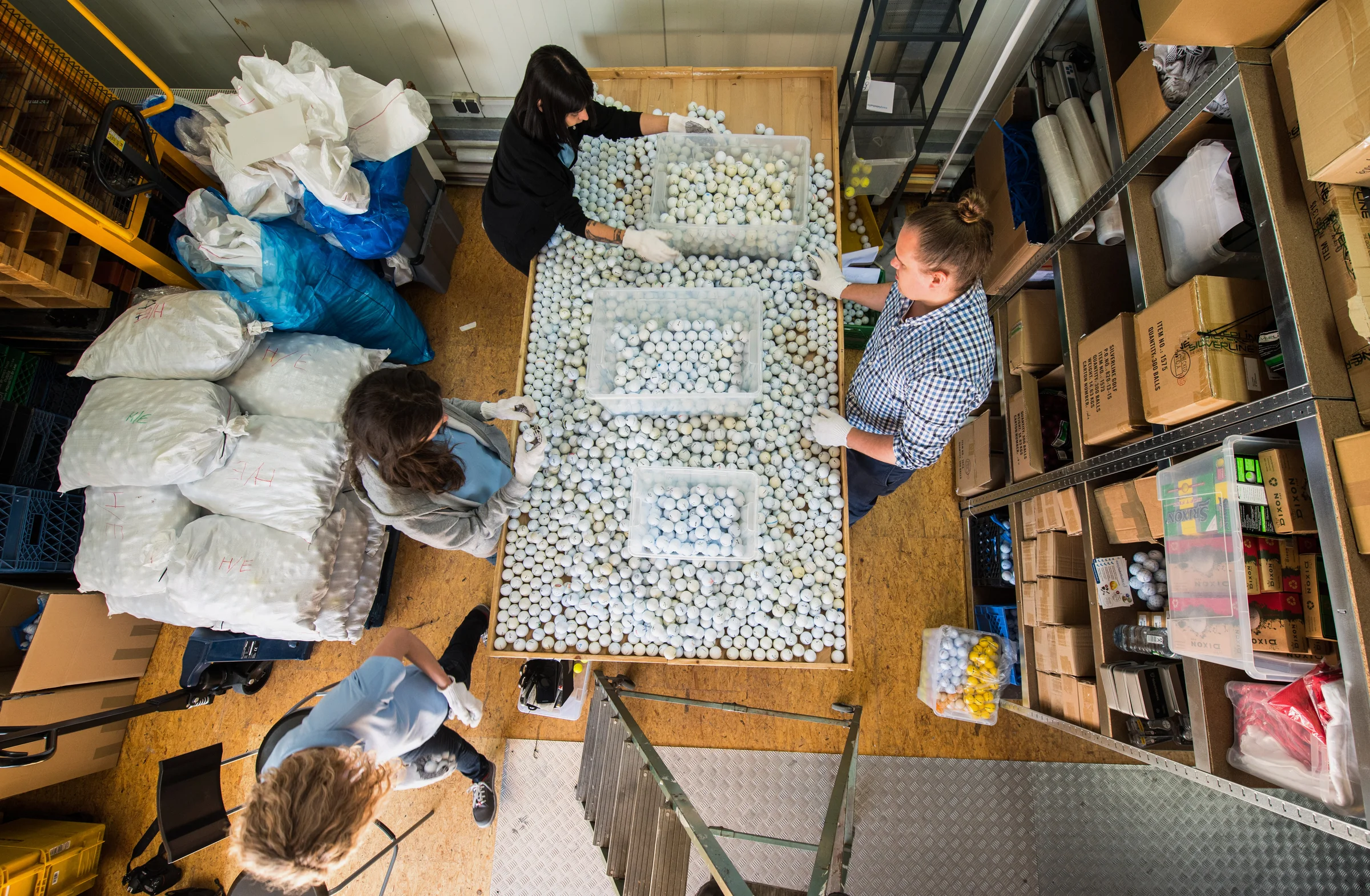 hundreds of reclaimed golf balls