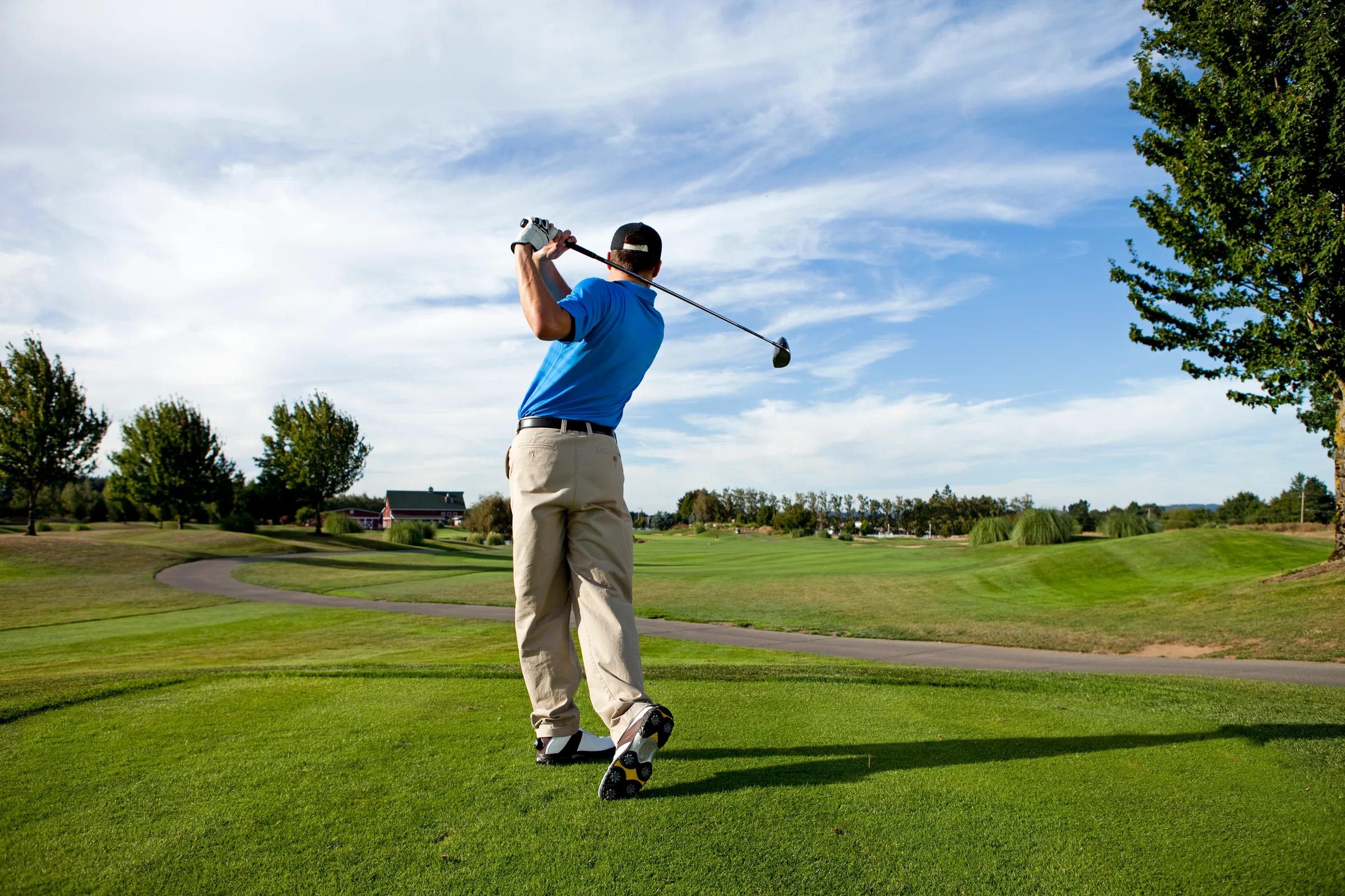 Golfers makes full swing