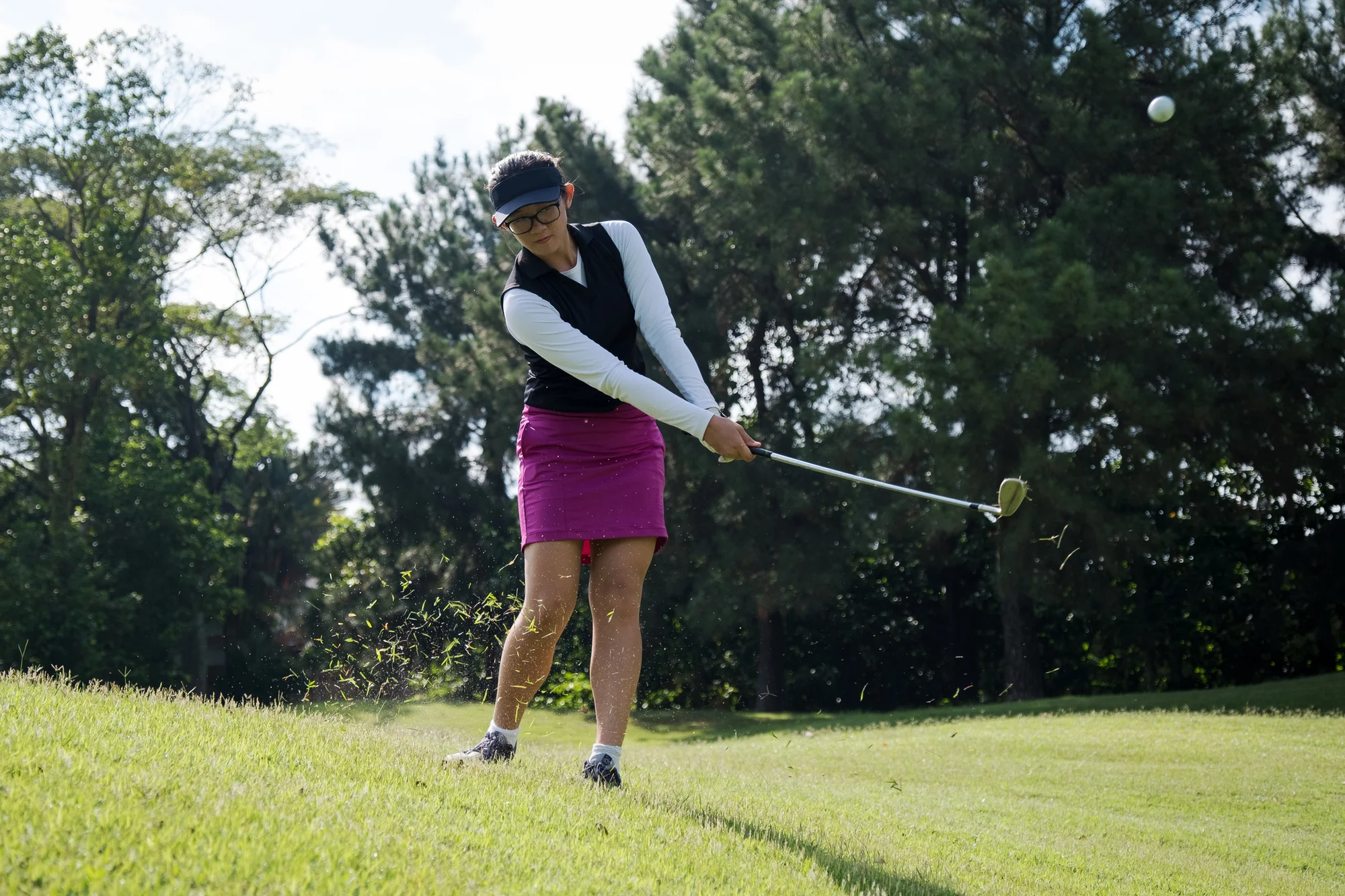 Golfer hitting a chip shot