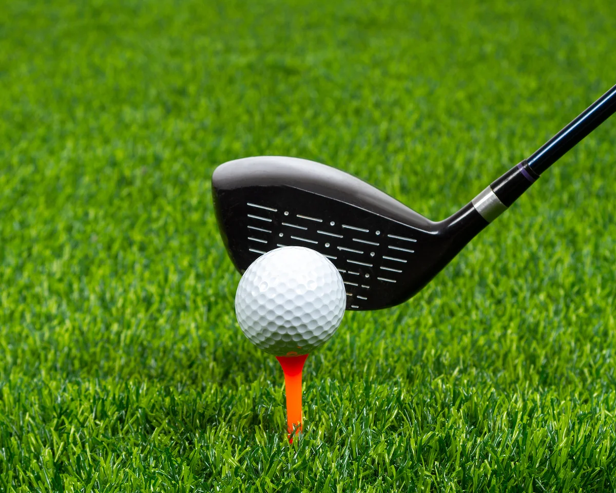 Driver and golf ball on tee