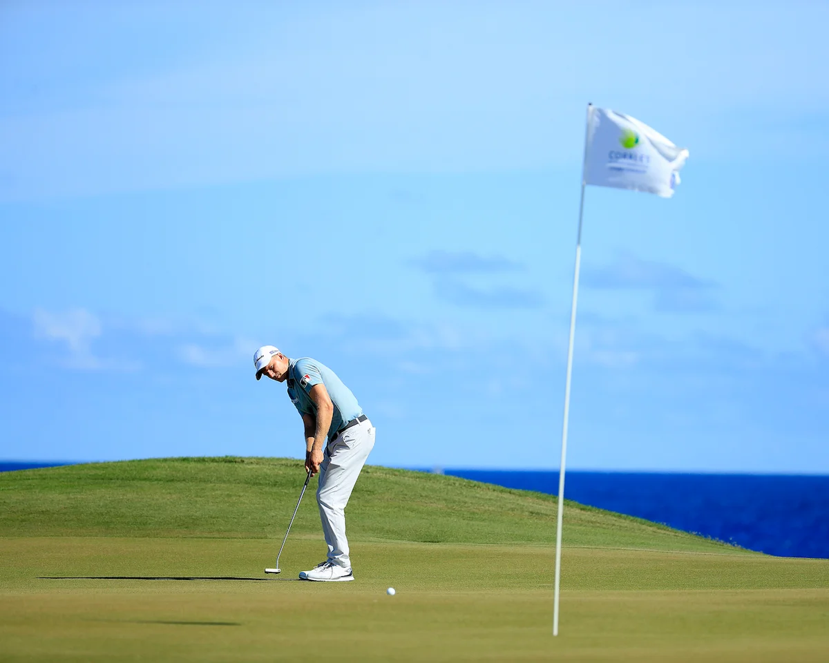 Golfer attempting lag putt