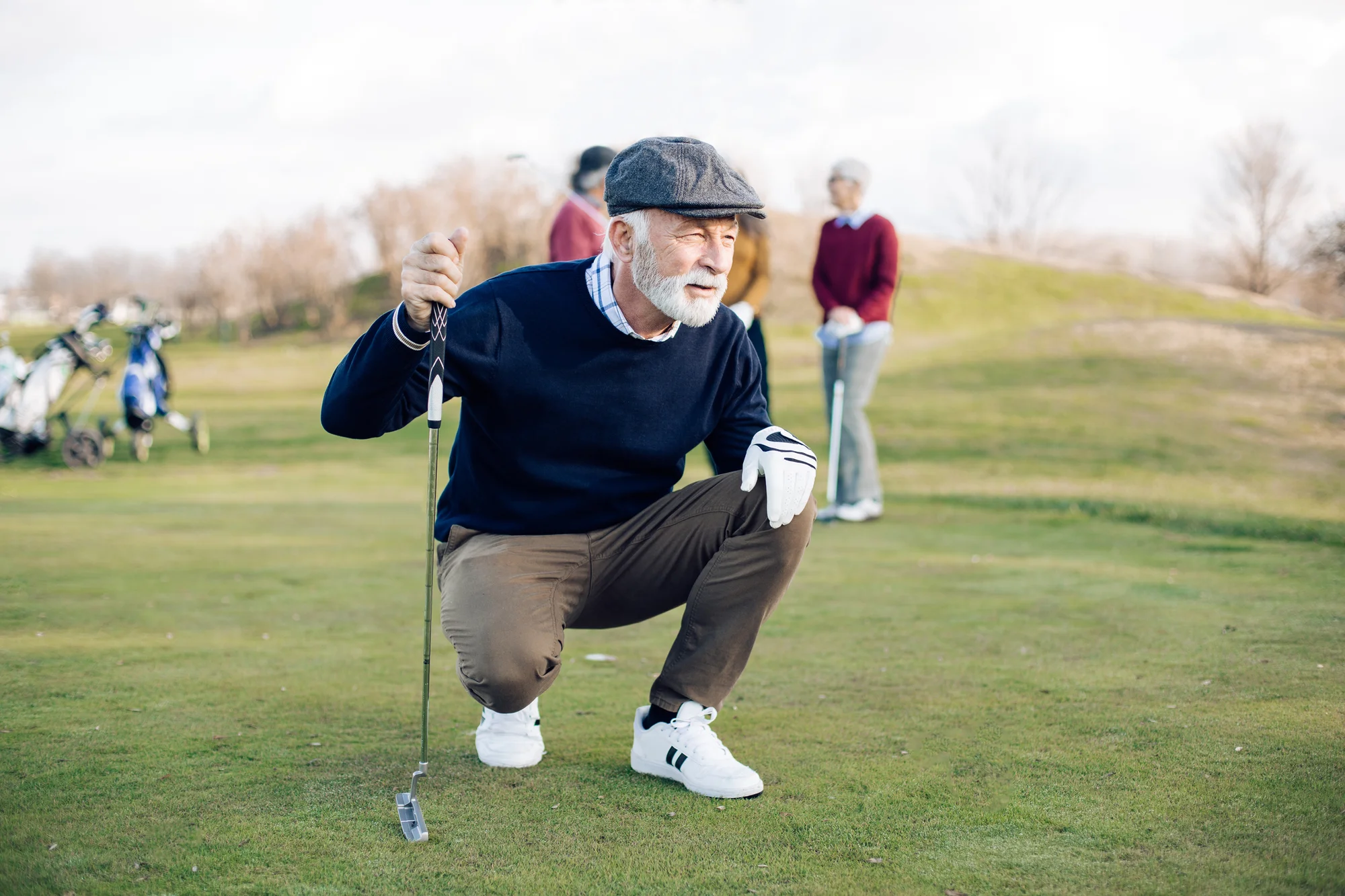 Senior golfer studying his next shot