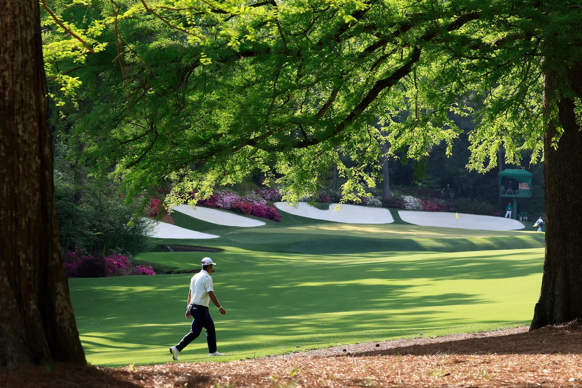 Hideki Matsuyama walking on Augusta National
