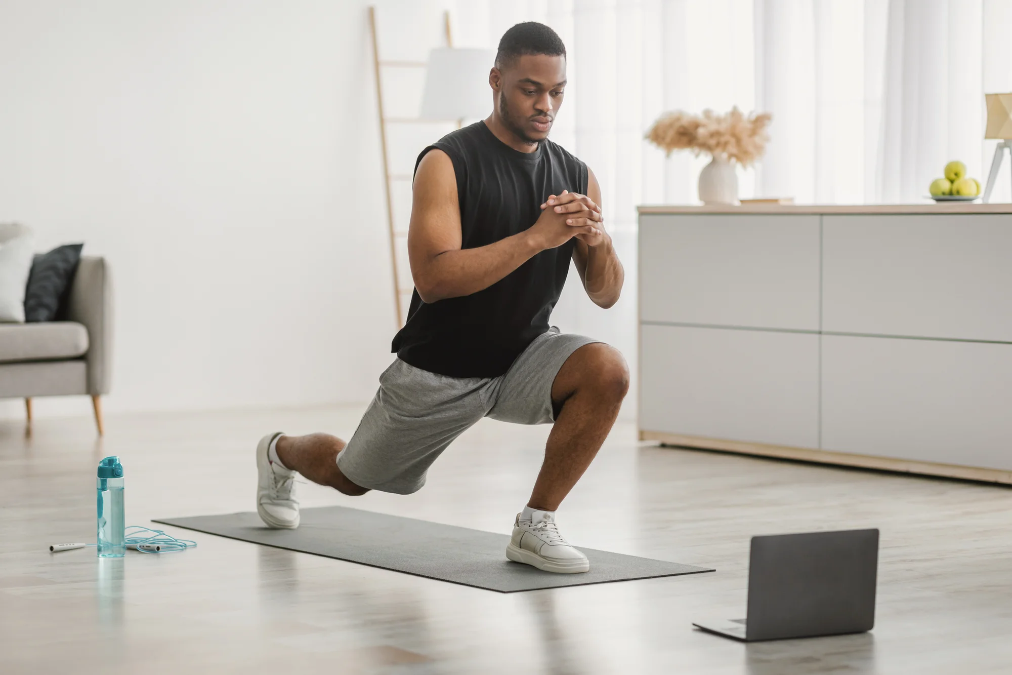 man doing a forward lunge