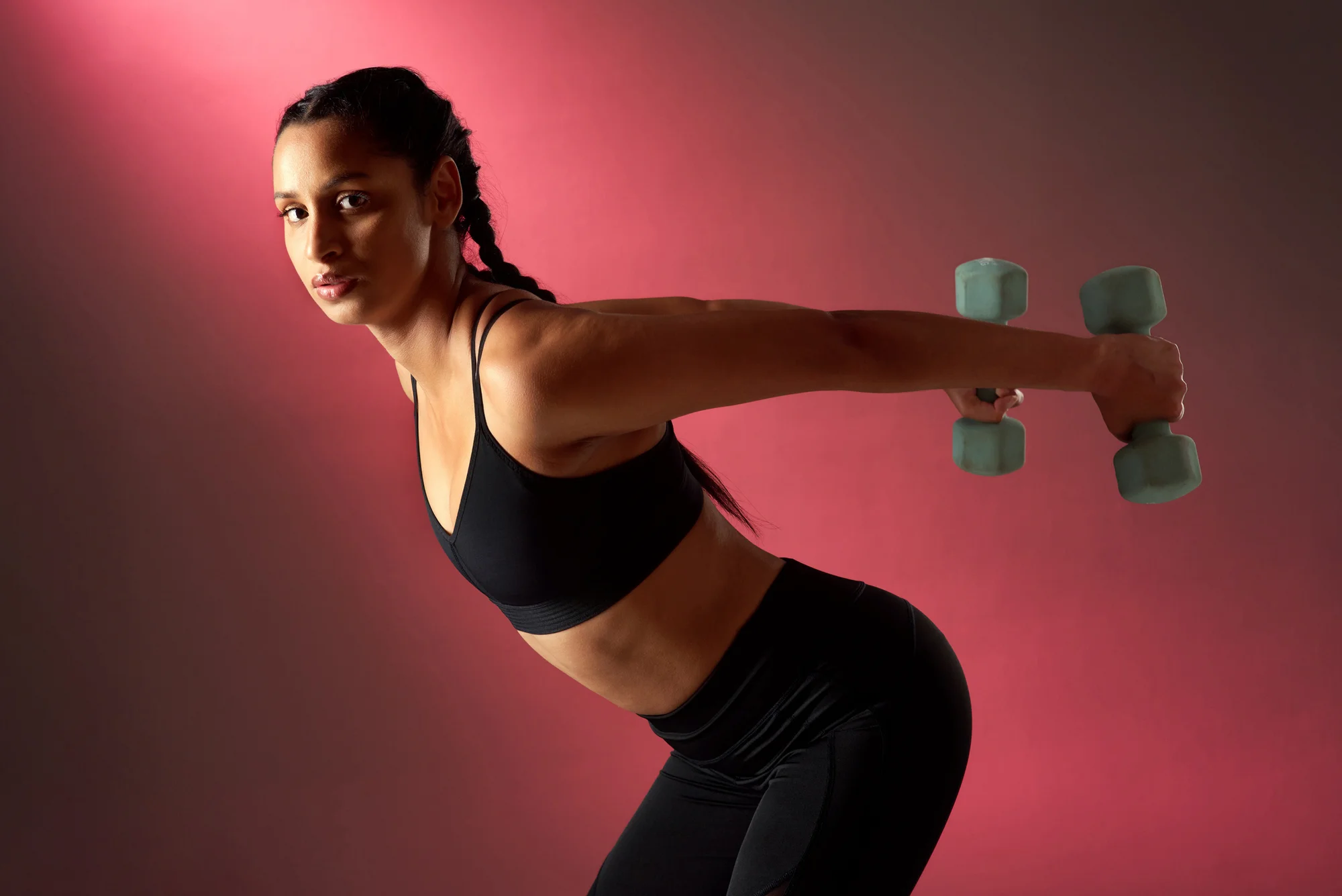 Woman doing tricep kickback