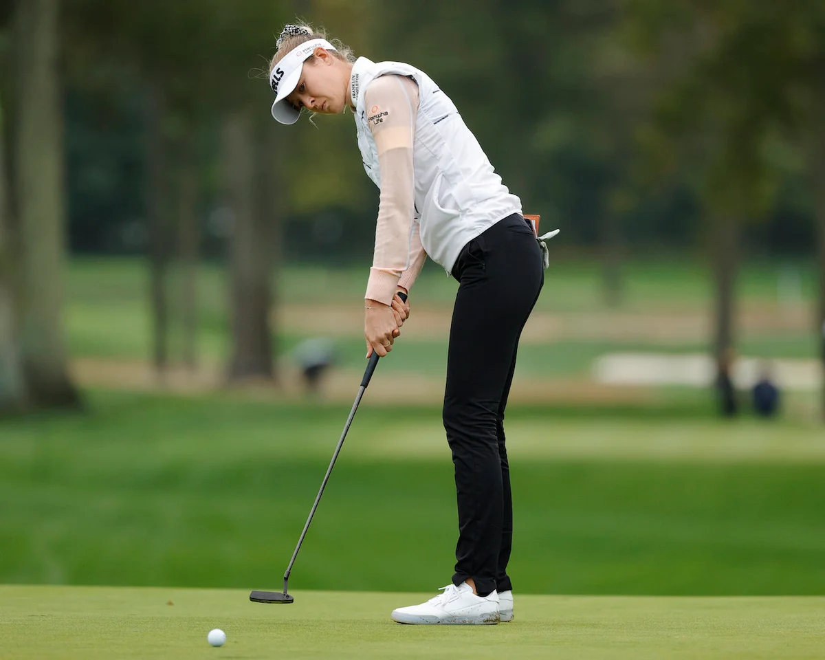 cross-handed putting grip