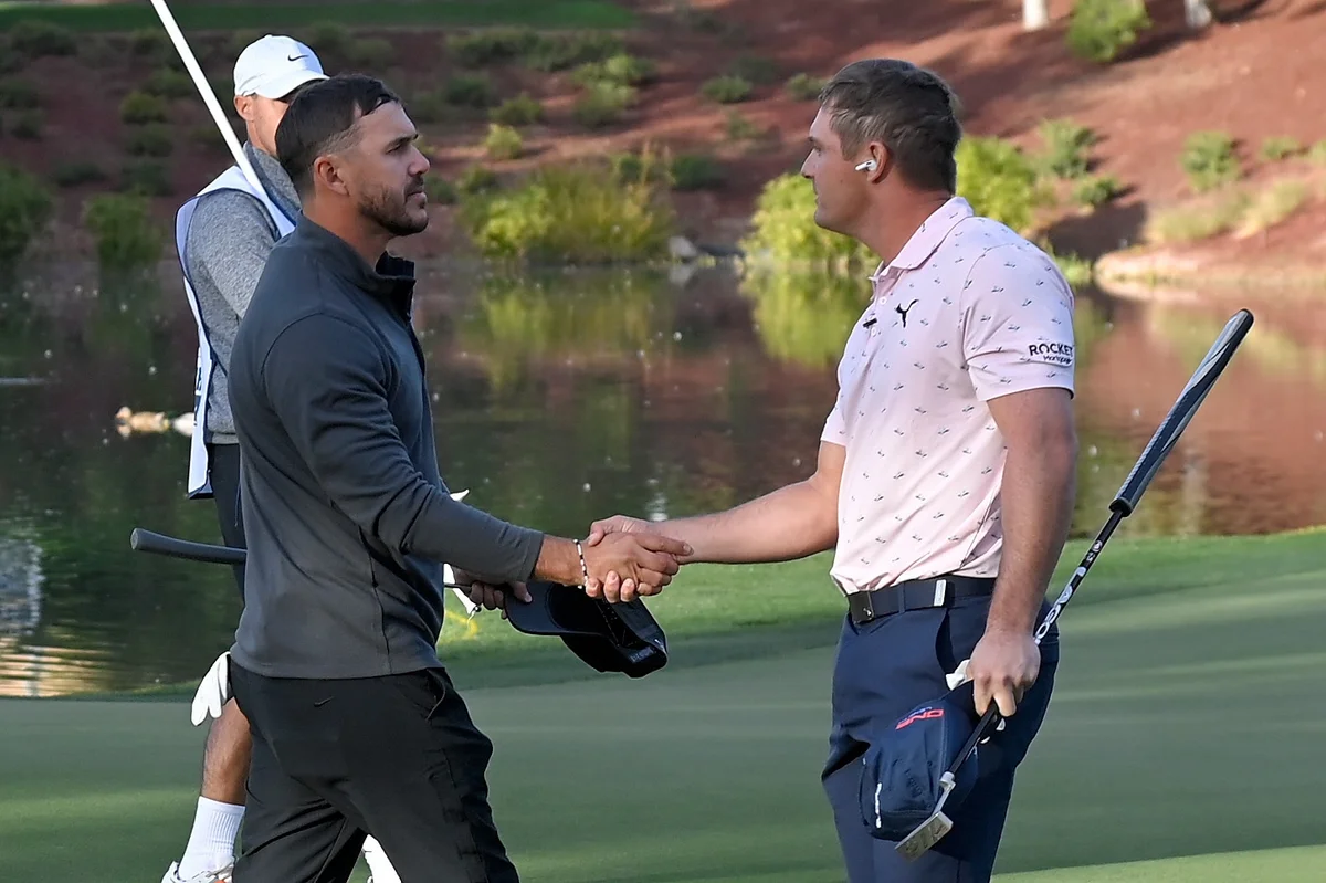 Brooks Koepka and Bryson DeChambeau shake hands at The Match