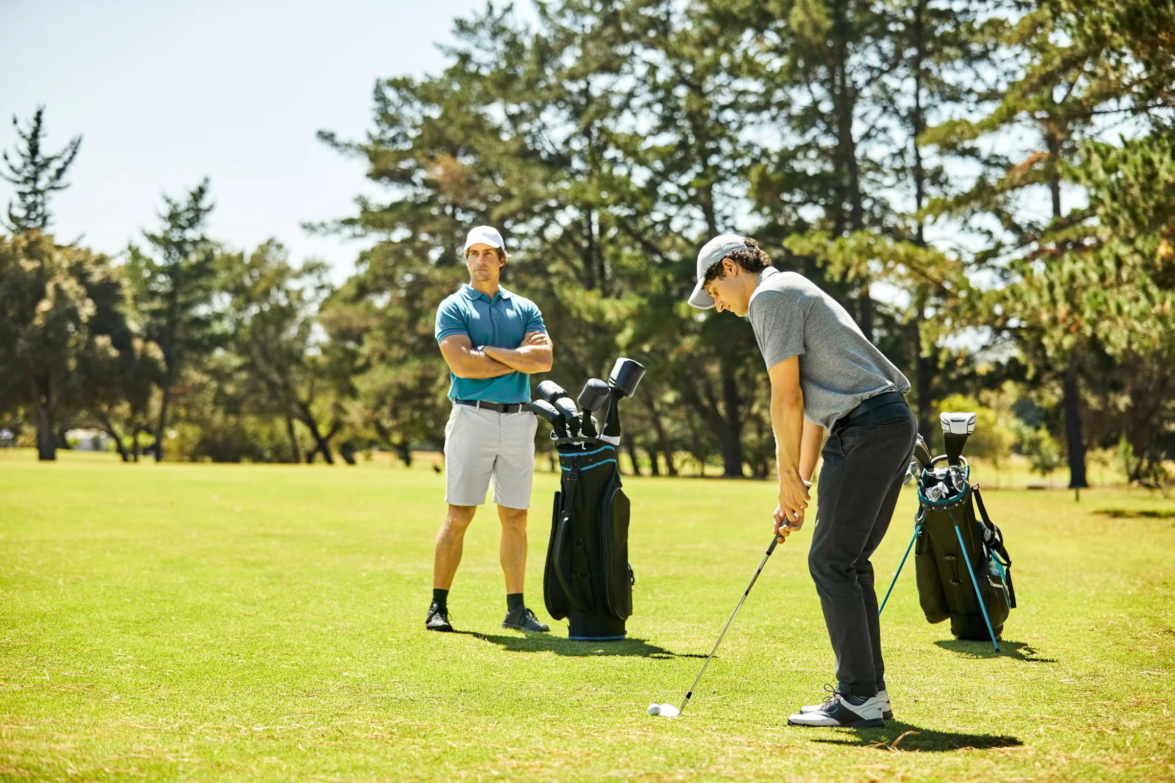 Golfer with sound posture, grip and alignment