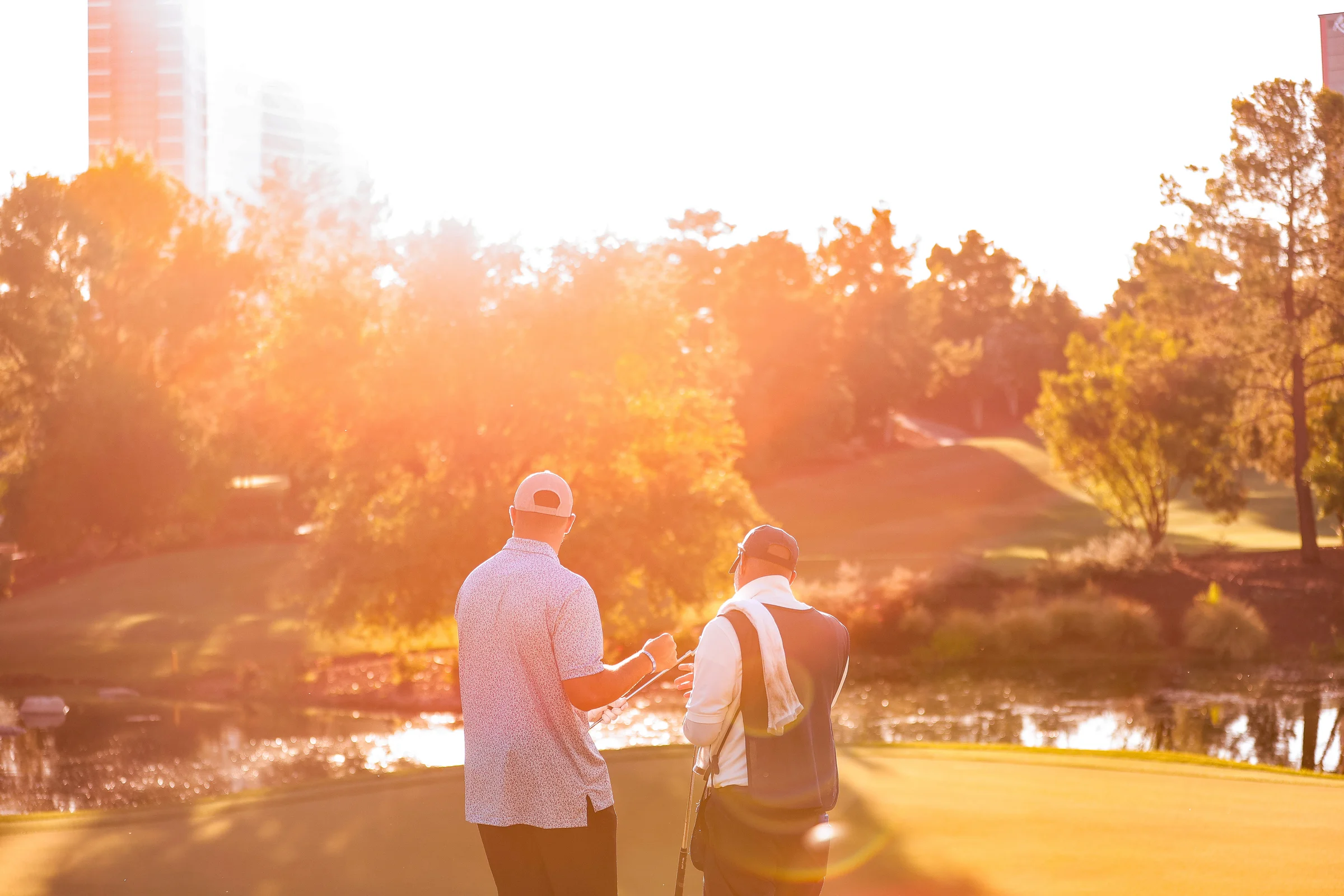 Player and caddie at Wynn Golf Club