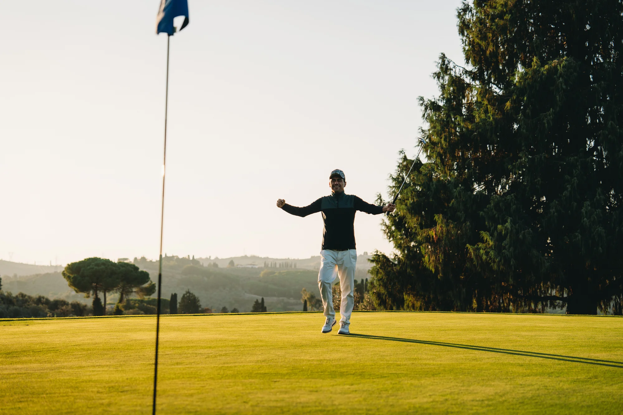 Golfer making a long putt